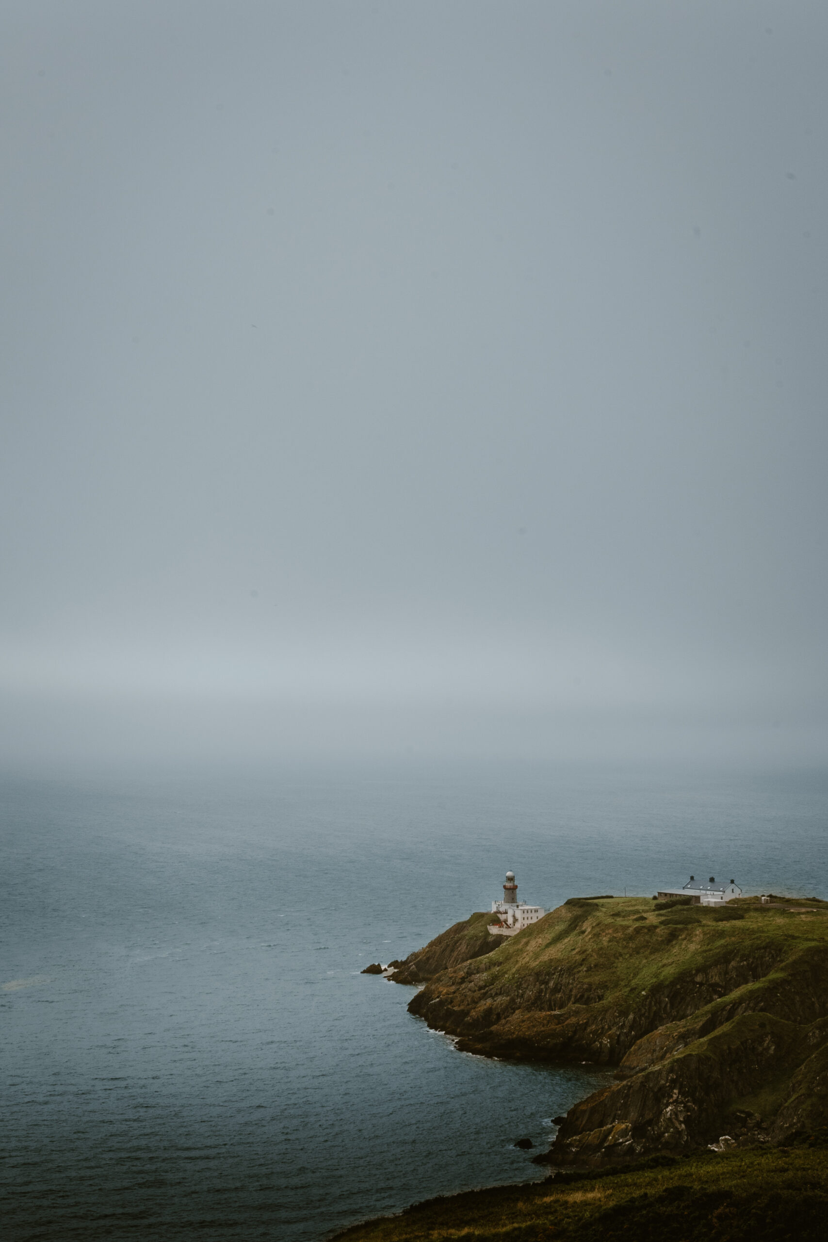 View on the lighthouse from the Bog of Frogs Loop hike in Ireland