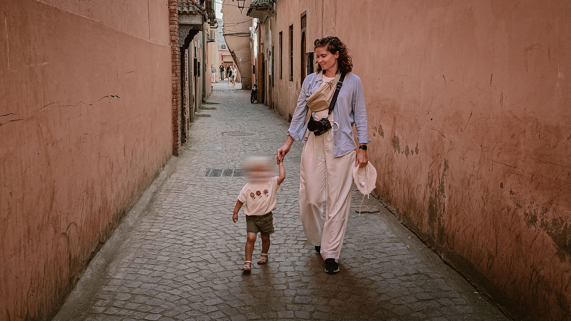 Mother and daughter walking the streets in Morocco