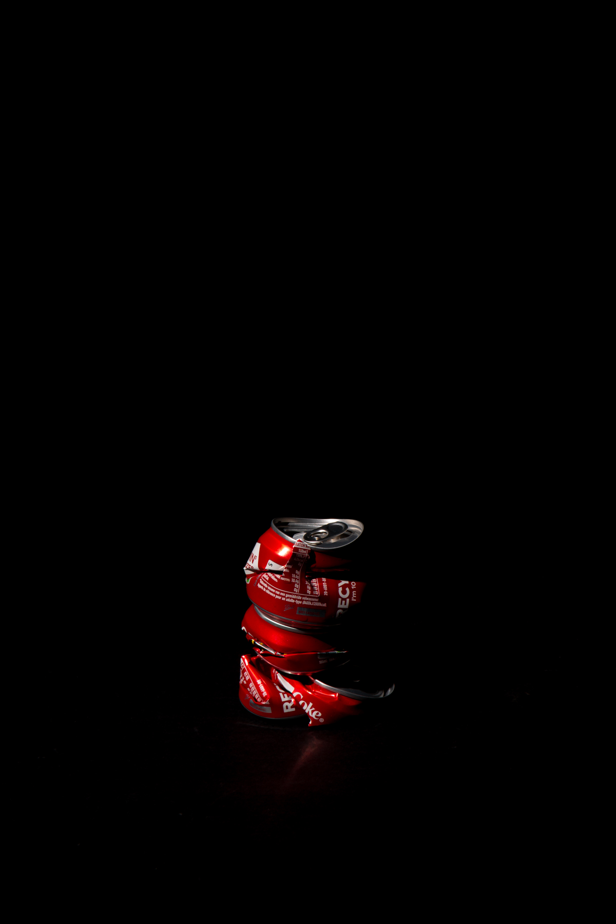 Coca Cola trashcan being almost recognisable from drawing from the bin, with only it's red color to know what it is.