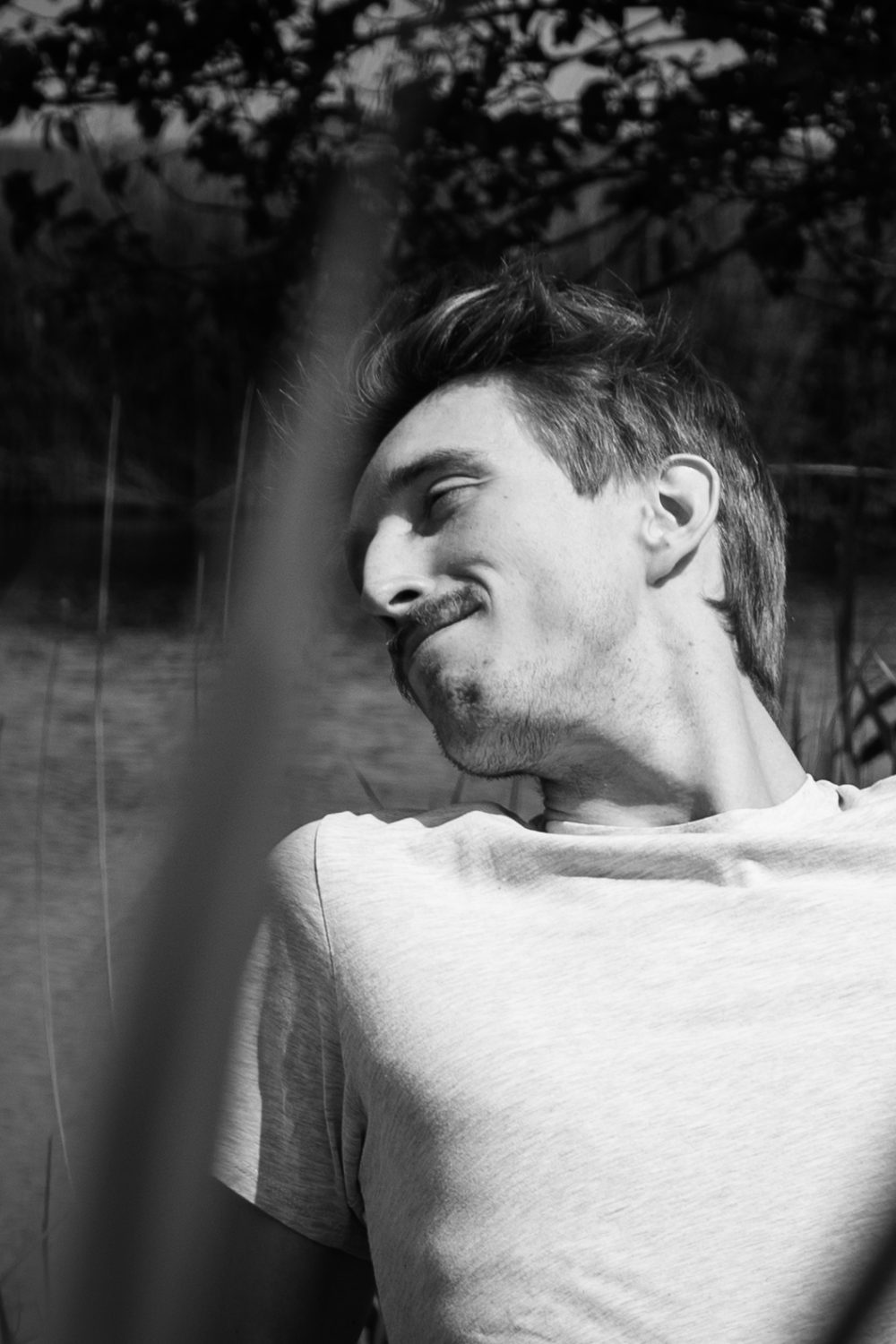 Black and white portrait of a man enjoyting nature