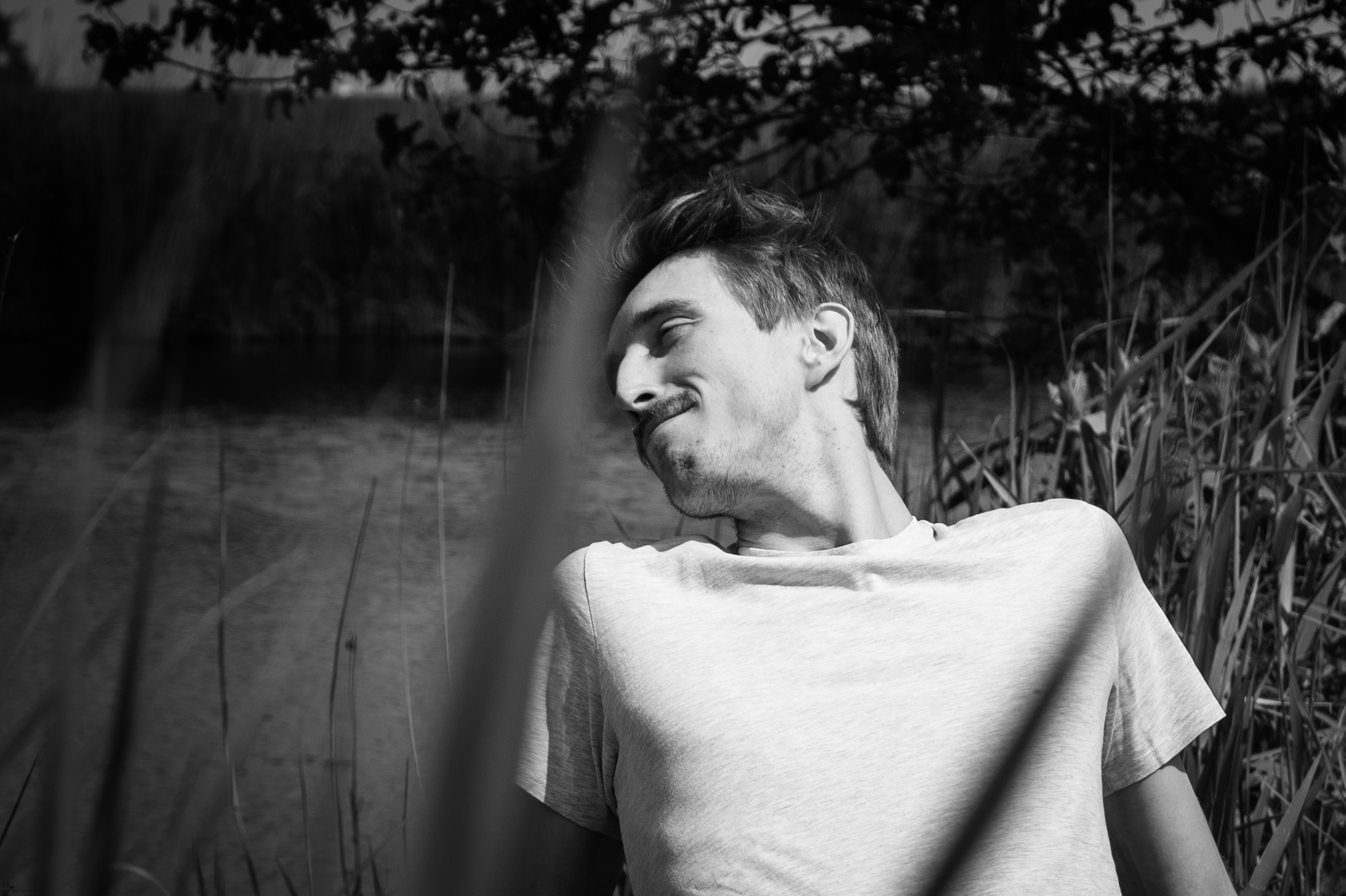 Black and white portrait of a man enjoyting nature